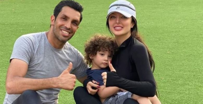 Sepehr Heydari, retired football defender with his family